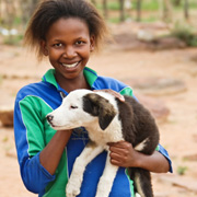 Afrikaans meisje met hond